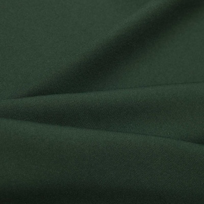 Ткань костюмная 21010 2076, 225 гр/м2, шир.150см, цвет т.зеленый - купить в Воронеже. Цена 390.73 руб.
